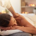 Woman,At,Spa,For,Massage,With,Therapist,And,Holistic,Treatment,